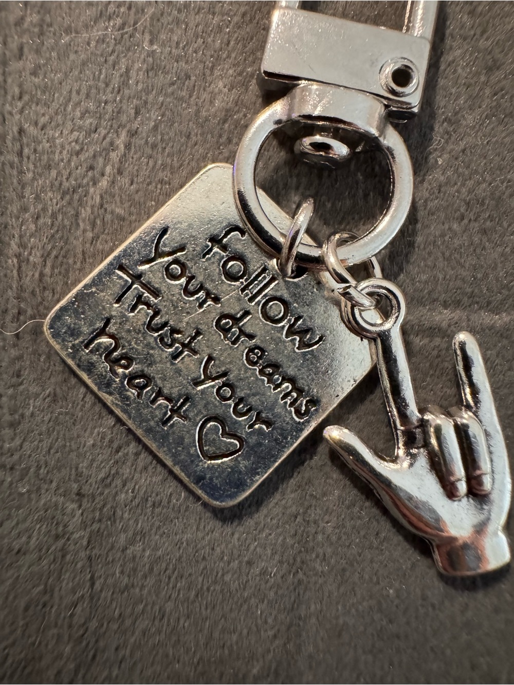 American Sign Language 🤟🏻 with
 - "Follow Your Dreams" charm